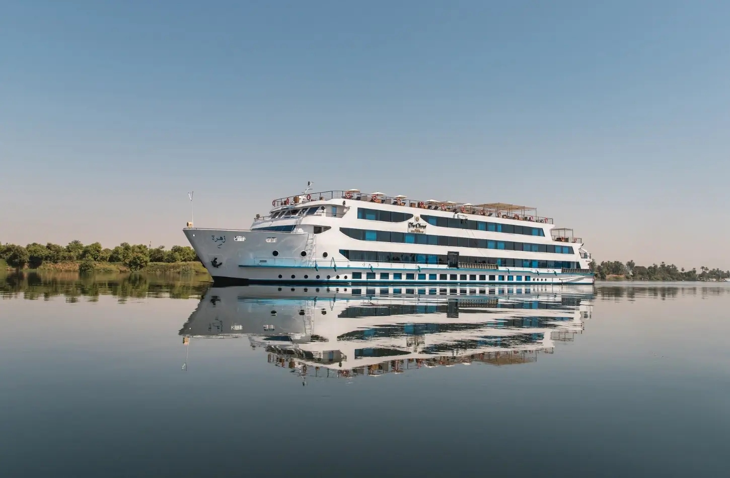 Large white Nile river cruise boat with several decks