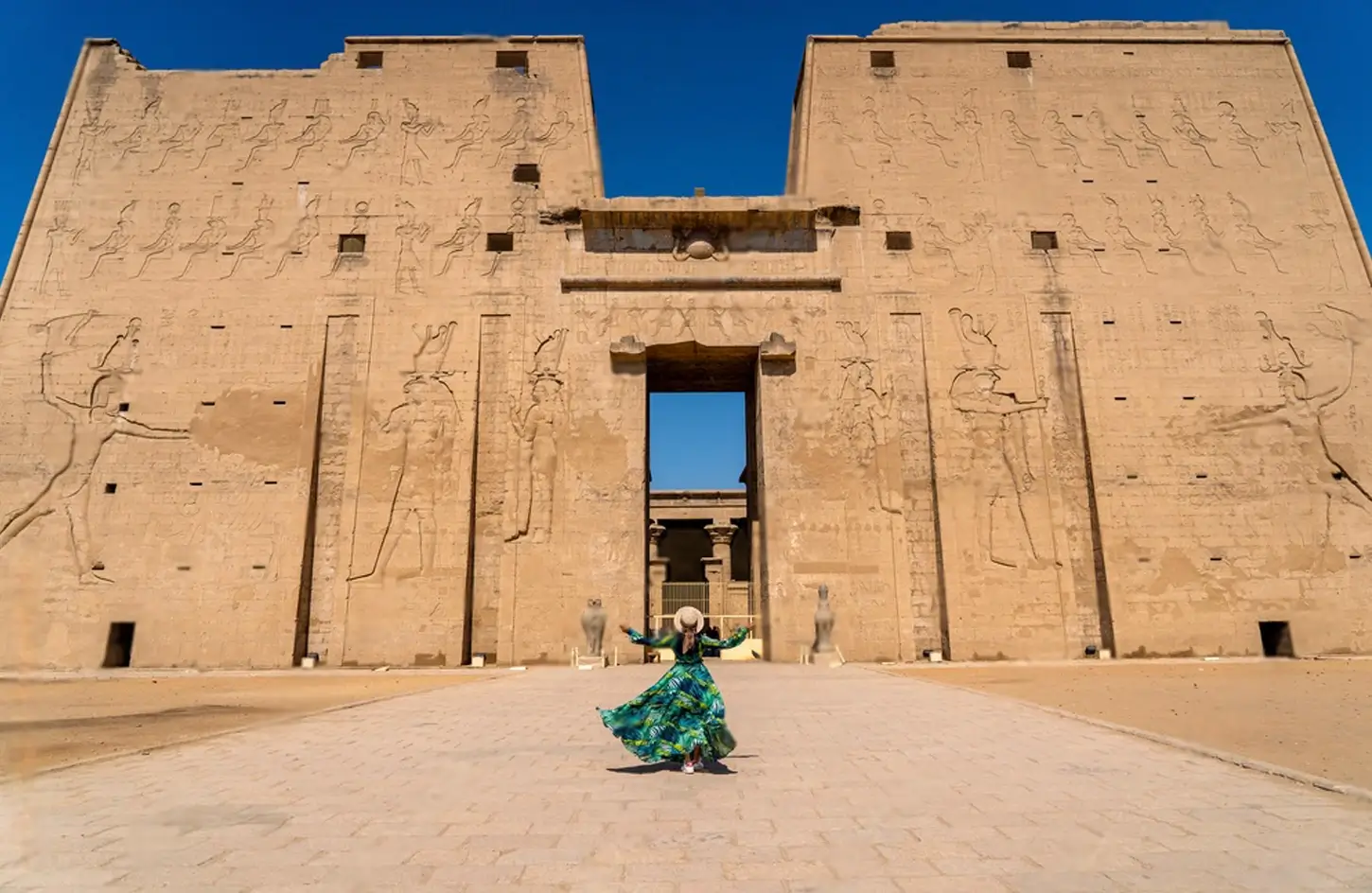 Tourist in front of the Temple of Edfu